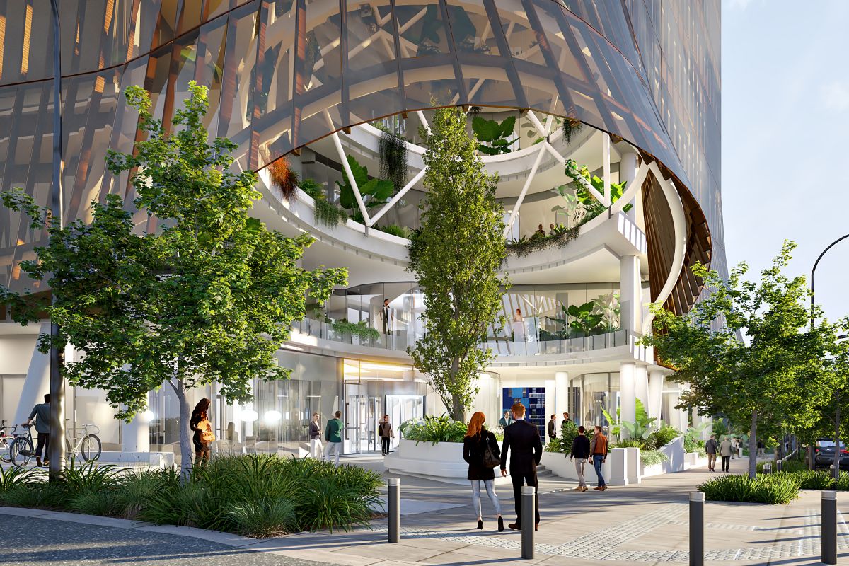 Artist impression of people standing at  an atrium entrance to RDX Lumina, GCHKP